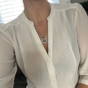 Twirled pendant warm and cool silver necklace